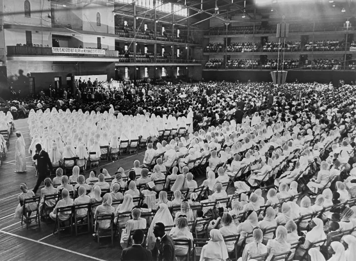 Framed Print : Elijah Muhammad addressing an assembly of white gowned Muslim followers in New York City in 1964 Framed Print : Elijah Muhammad addressing an assembly of white gowned Muslim followers in New York City in 1964