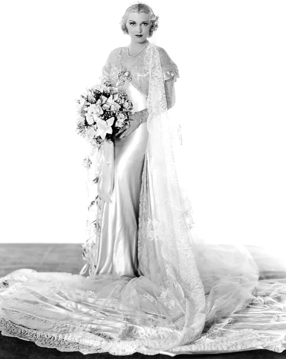 Framed Print : ELINOR NORTON, Claire Trevor, in a white satin wedding gown by Rene Hubert, 1934. TM & Copyright 20th Century Fox Film Corp. / courtesy Everett Collection