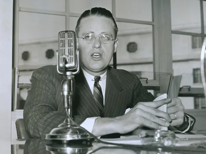Framed Print : Elliott Roosevelt, testifies at FCC hearing. He represented the Texas State Network, an organization of Broadcasting stations, as he testified on March 7, 1939