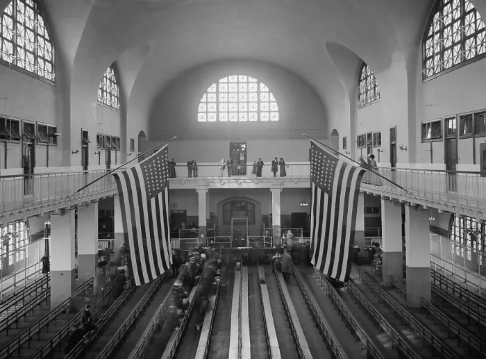 Framed Print : Ellis Island inspection room, c. 1910-1920. The uncrowded space shows the drastically reduced the flow of European immigrants to the US during World War 1 (BSLOC_2018_1_14)
