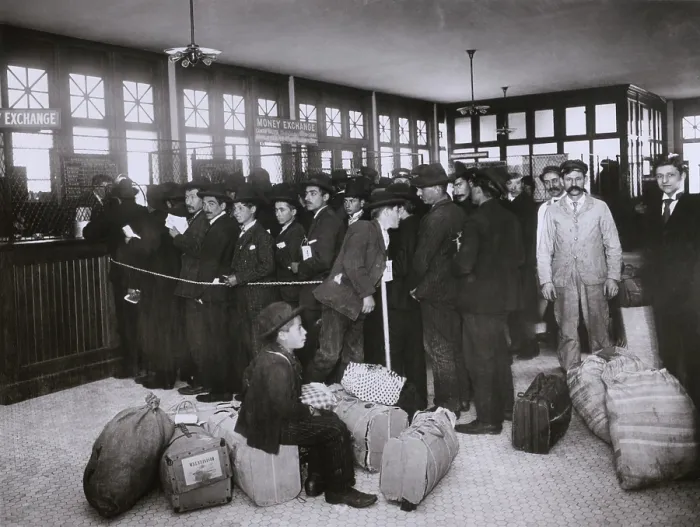 Framed Print : Ellis Island provided new immigrants with services to prevent their exploitation by dishonest moneychangers. The Money Exchange converted their currencies without charge. Ca. 1910 Framed Print : Ellis Island provided new immigrants with services to prevent their exploitation by dishonest moneychangers. The Money Exchange converted their currencies without charge. Ca. 1910