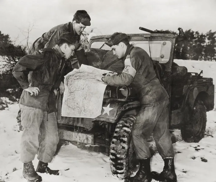Framed Print : Elvis Presley and other soldiers read a map on maneuvers in Germany. He served with the with 1st Medium Tank Battalion, 3d Armored Division. Ca. 1959 - (BSLOC_2014_17_106)