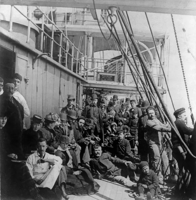 Framed Print : Emigrants on the crowded lower deck of a steamship, crossing the Atlantic Ocean. Ca. 1890