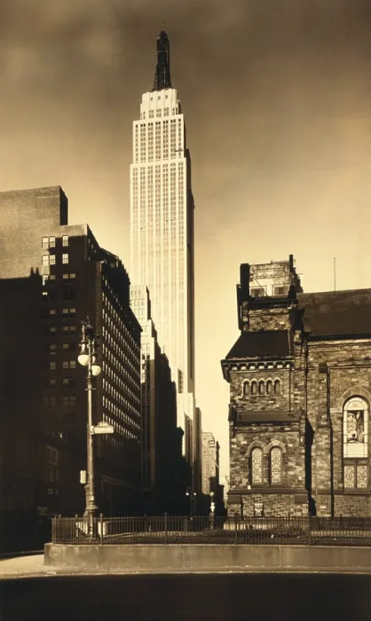 Framed Print : Empire State Building, in New York City in its final stage of construction. The tower lacks its Art Deco facing. Ca. 1930. Photo by Irving Underhill