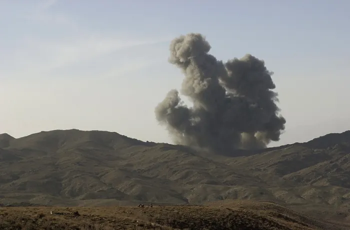 Framed Print : An enemy position in Afghanistan's Gardez Valley is destroyed by smart bombs dropped by B-52 bombers attacking al-Qaeda and Taliban forces. Mar
