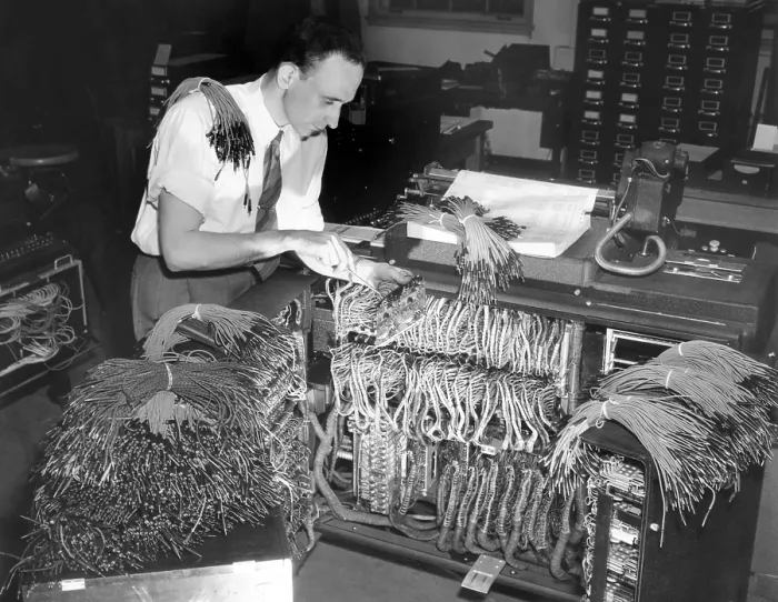 Framed Print : A engineer works on a IBM computer used to administer the Gl insurance dividend for millions of veterans