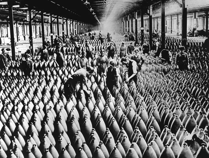 Framed Print : English women and men working in storage shed for large shells of a munitions factory