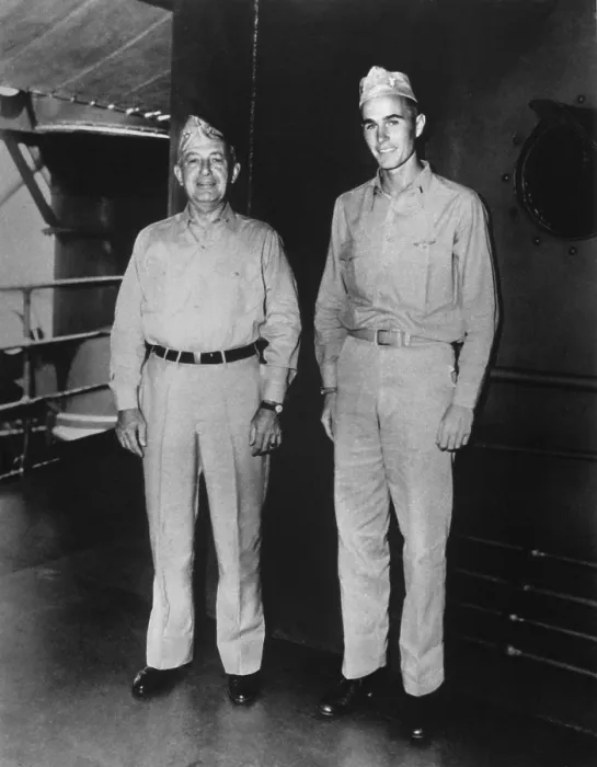 Framed Print : Ensign George H.W. Bush stands with Rear Admiral James Kauffmann ca. 1943. They were relatives by the marriage of Kauffmans daughters to Bushs brother, Prescott