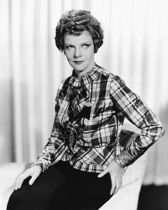Framed Print : ENTER MADAME, Elissa Landi, modeling a plaid taffeta blouse in black, white and green, with ill-advised diamond accessories, 1935