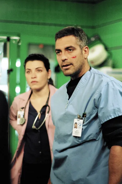 Framed Print : E.R. (from left): Julianna Margulies, George Clooney, The Storm, Part I, (Season 5, aired Feb. 11, 1999), 1994-2009