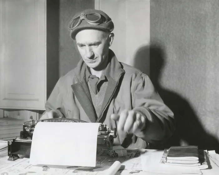 Framed Print : Ernie Pyle, war correspondent, at his typewriter while reporting from the Anzio Beachhead, Italy. (BSLOC_2014_8_220)