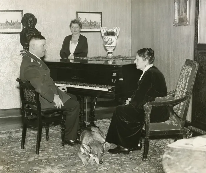 Framed Print : Ernst Roehm, Chief of Sturmabteilung (SA), with his mother, Emilie Roehm, ca. 1933. Standing beside the piano, his sister. (BSLOC_2015_13_46) Framed Print : Ernst Roehm, Chief of Sturmabteilung (SA), with his mother, Emilie Roehm, ca. 1933. Standing beside the piano, his sister. (BSLOC_2015_13_46)