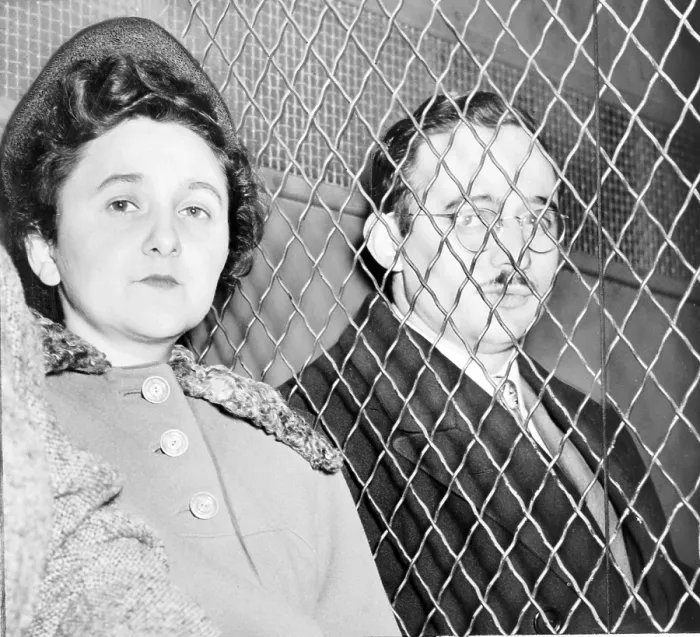 Framed Print : Ethel and Julius Rosenberg, separated by heavy wire screen as they leave U.S. Court House after being found guilty of treason by a jury. photo by Roger Higgins. 1951 Framed Print : Ethel and Julius Rosenberg, separated by heavy wire screen as they leave U.S. Court House after being found guilty of treason by a jury. photo by Roger Higgins. 1951