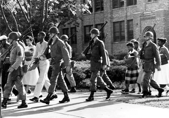 Framed Print : EV1815 - Daisy Bates (looking at camera on the left) and the National Guard leading nine African-American students into an all-white high school, September 1957