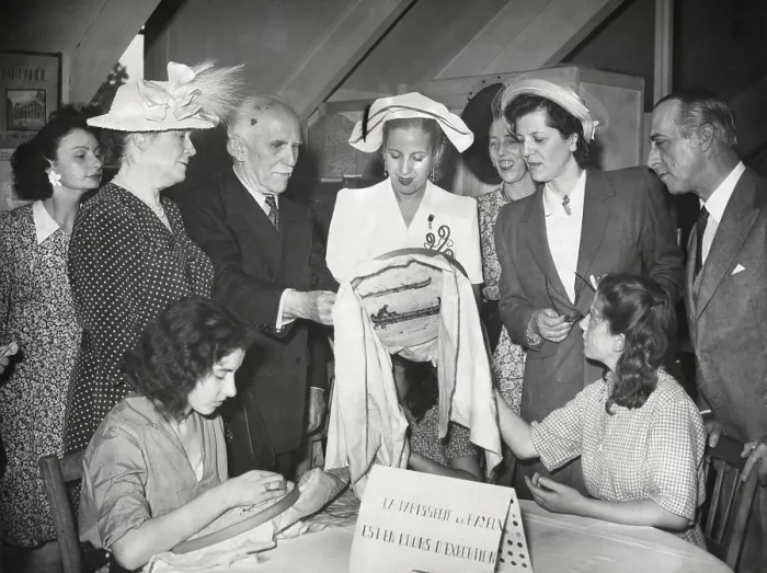 Framed Print : Eva Peron visiting a sewing workshop where women workers were engaged in embroidery. July 1947. - (BSLOC_2014_17_69)