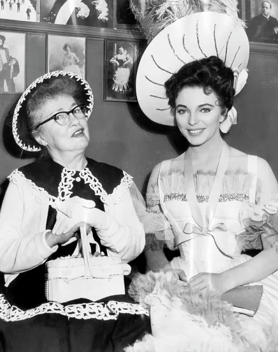 Framed Print : Evelyn Nesbit (left), visiting the movie set where Joan Collins (right) is portraying her in the film The Girl In The Red Velvet Swing, 1955 Framed Print : Evelyn Nesbit (left), visiting the movie set where Joan Collins (right) is portraying her in the film The Girl In The Red Velvet Swing, 1955