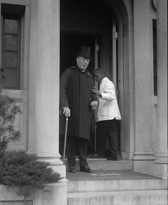 Framed Print : Ex-President Woodrow Wilson (1856-1924), weakened by a severe stroke in 1919, is supported by an African American servant