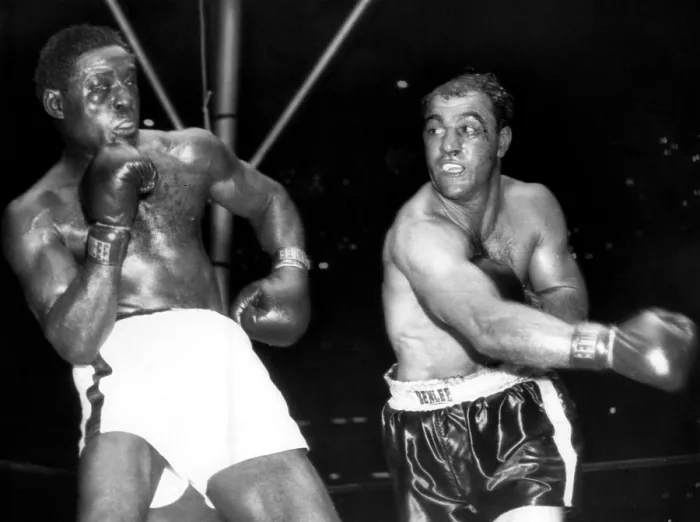 Framed Print : Ezzard Charles, heavyweight champion Rocky Marciano, in a title bout at Yankee Stadium, New York, June 17, 1954.. Courtesy: CSU Archives  /  Everett Collection