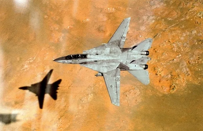 Framed Print : F-14 Tomcat aircraft passes over western Saudi Arabia during low-altitude flight from the aircraft carrier USS THEODORE ROOSEVELT. Apr 1 1991. (BSLOC_2011_12_1)