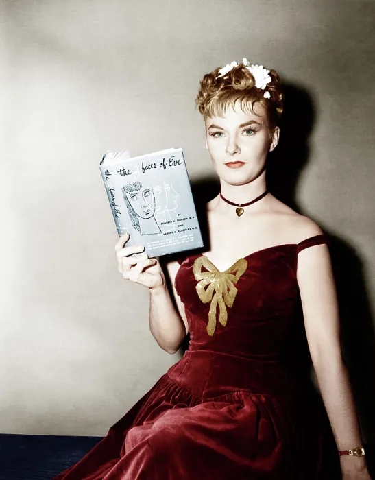 Framed Print : THE THREE FACES OF EVE, Joanne Woodward holding a copy of the bestseller, 1957. 20th Century-Fox FIlm Corporation, TM & Copyright / courtesy Everett Collection Framed Print : THE THREE FACES OF EVE, Joanne Woodward holding a copy of the bestseller, 1957. 20th Century-Fox FIlm Corporation, TM & Copyright / courtesy Everett Collection