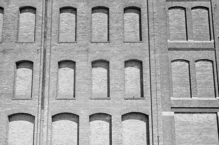 Framed Print : Factory windows bricked up for conversion to a warehouse in Minneapolis, Minnesota, during the Great Depression. 1939 Framed Print : Factory windows bricked up for conversion to a warehouse in Minneapolis, Minnesota, during the Great Depression. 1939