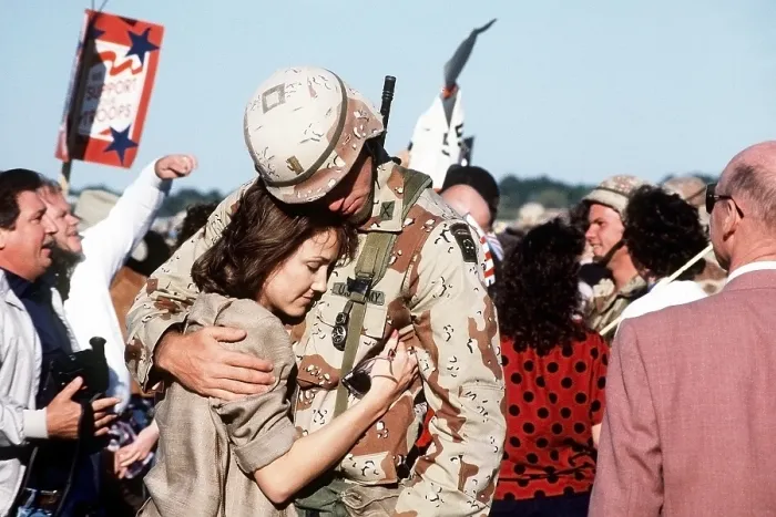 Framed Print : Family and friends greet members of the 82nd Airborne Division upon their return from Operation Desert Storm. Apr. 2 1991. (BSLOC_2011_12_15)