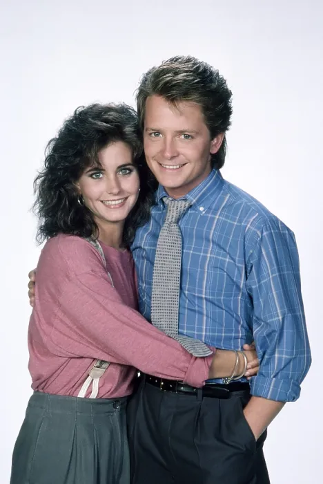 Framed Print : FAMILY TIES, from left, Courteney Cox, Michael J. Fox, 1982-89 (1987 photo)