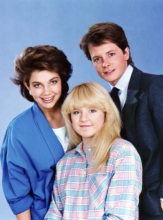 Framed Print : FAMILY TIES, from left: Justine Bateman, Tina Yothers, Michael J. Fox, 1982-89
