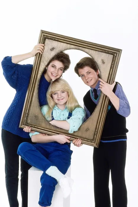Framed Print : FAMILY TIES, from left, Justine Bateman, Tina Yothers, Michael J. Fox, 1982-89 (1985 photo)