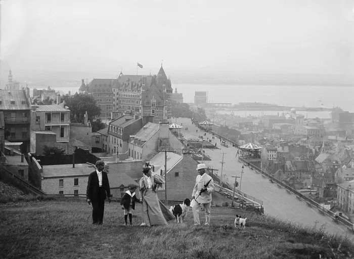 Framed Print : A family walks on the heights of Quebec City. Le Chteau Frontenac in the background is still the premier Quebec City landmark. 1910's