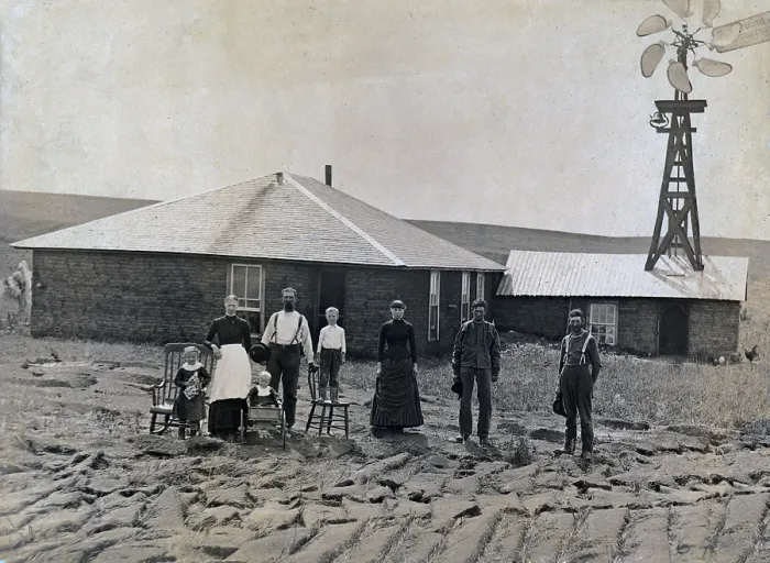 Framed Print : A farm family standing in front of sod house and windmill. Coburg, Nebraska 1885