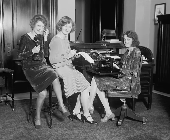 Framed Print : Fashionable young women in a Washington, D.C. office, May 1, 1929. One holds a telephone, another a stenographic pad, and the third sits at a typewriter. (BSLOC_2015_16_226) Framed Print : Fashionable young women in a Washington, D.C. office, May 1, 1929. One holds a telephone, another a stenographic pad, and the third sits at a typewriter. (BSLOC_2015_16_226)