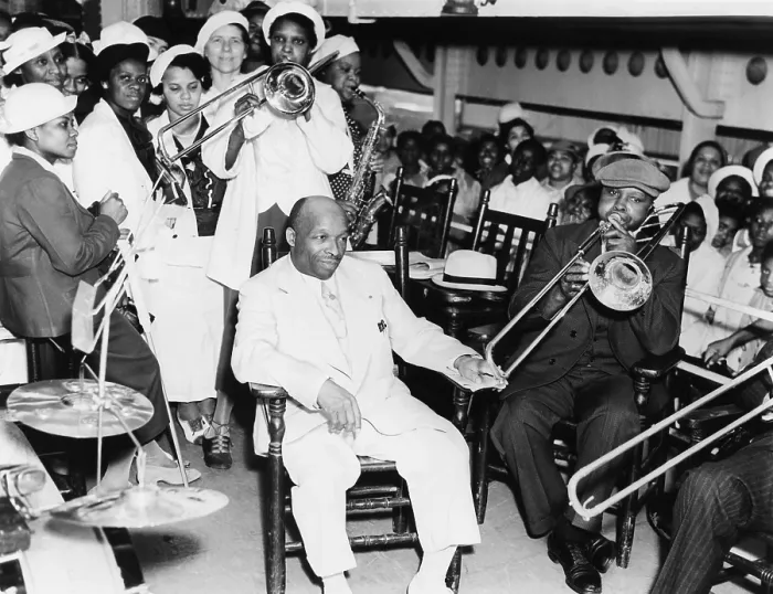 Framed Print : Father Divine is serenaded by followers on the steamer, Aug. 8, 1937. He is bound for his cult's Promised Land Olympic Games, in Kingston, N.Y