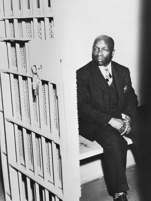 Framed Print : Father Divine sitting in a jail cell, April 21, 1937 Framed Print : Father Divine sitting in a jail cell, April 21, 1937
