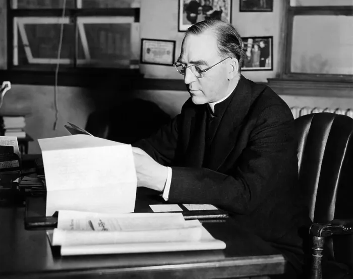 Framed Print : Father Edward J. Flanagan, founder and director of Father Flanagan's Boy's Home at Boys Town, Nebraska, is shown at his desk. Ca. 1935 Framed Print : Father Edward J. Flanagan, founder and director of Father Flanagan's Boy's Home at Boys Town, Nebraska, is shown at his desk. Ca. 1935