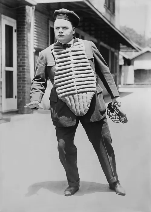 Framed Print : Fatty Arbuckle, American actor, in baseball catchers uniform movie set, c. 1920. His full name was Roscoe Conkling Arbuckle, after the NYC politician, Congressman, and Senator Framed Print : Fatty Arbuckle, American actor, in baseball catchers uniform movie set, c. 1920. His full name was Roscoe Conkling Arbuckle, after the NYC politician, Congressman, and Senator