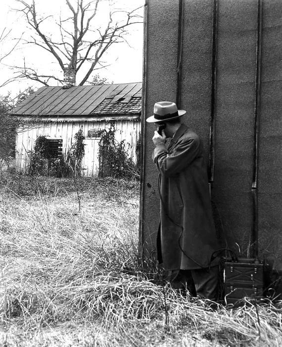 Framed Print : FBI agents with an huge portable phone during a kidnapping stakeout. Ca. 1940s