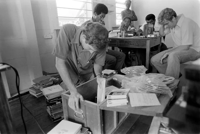 Framed Print : FBI agents in Jonestown, going through files and tapes. The materials were left by People's Temple in Jonestown, Guyana after their mass suicide of Nov. 18, 1978