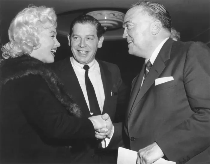 Framed Print : FBI Director J. Edgar Hoover shaking hands with Marilyn Monroe. With Milton Berle, they attended a Banshee Lunch, at the Waldoff Astoria, New York City