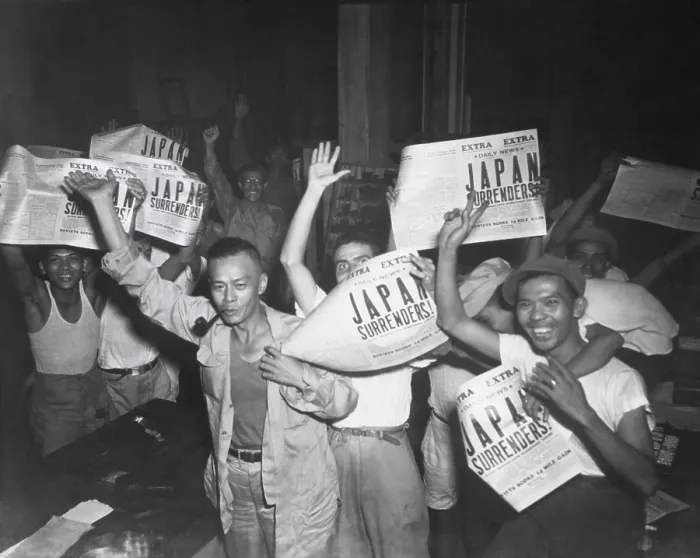 Framed Print : Filipinos celebrate headlines, Japan Surrenders at the end of World War 2. August 10-15, 1945. (BSLOC_2014_10_274)