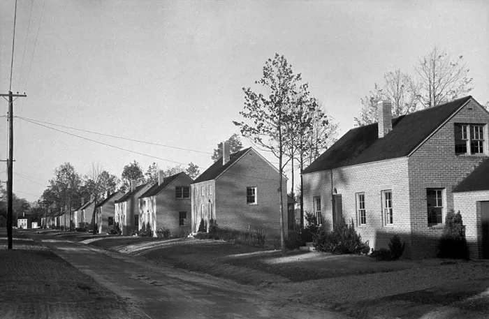 Framed Print : Finished brick homes in the Newport News Housing project for African Americans, Oct. 1937. The homes would be sold on long term payment plan. Photo by John Vachon