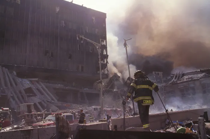 Framed Print : Fire fighters amid smoking rubble following September 11th terrorist attack on World Trade Center