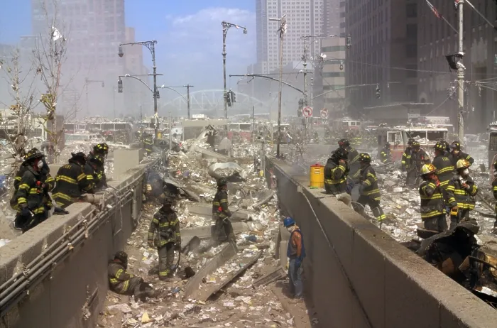 Framed Print : Fireman and other rescue workers on the northwest corner of the World Trade Center site