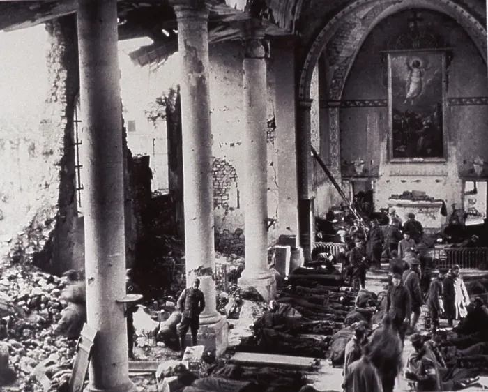 Framed Print : A first aid station in a bombed-out church, on the western front in World War I. U.S. soldiers lay on stretchers on the floor