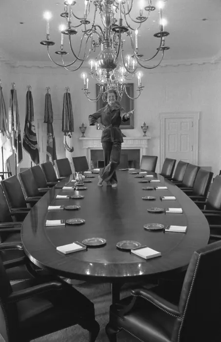 Framed Print : First Lady Betty Ford dances on the Cabinet Room table on the day before departing the White House upon the inauguration of President Jimmy Carter. January 19, 1977
