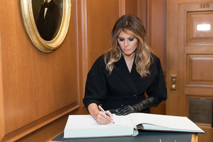 Framed Print : First Lady Melania Trump signing the guest book at the investiture of Brett Kavanaugh, as an Associate Justice of the Supreme Court, Nov. 8, 2018 (BSLOC_2018_9_196)
