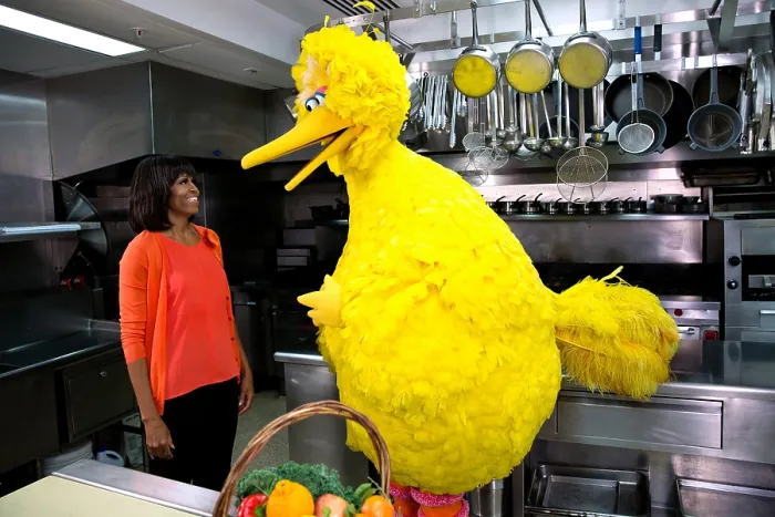 Framed Print : First Lady Michelle Obama with Big Bird in the White House Kitchen, Feb. 13, 2013