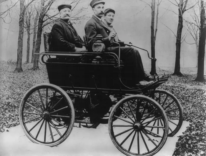 Framed Print : The first Oldsmobile used control sticks for steering in 1897. The Olds Motor Vehicle Co. was founded by Ransom E. Olds in 1897 and purchased by General Motors in 1908