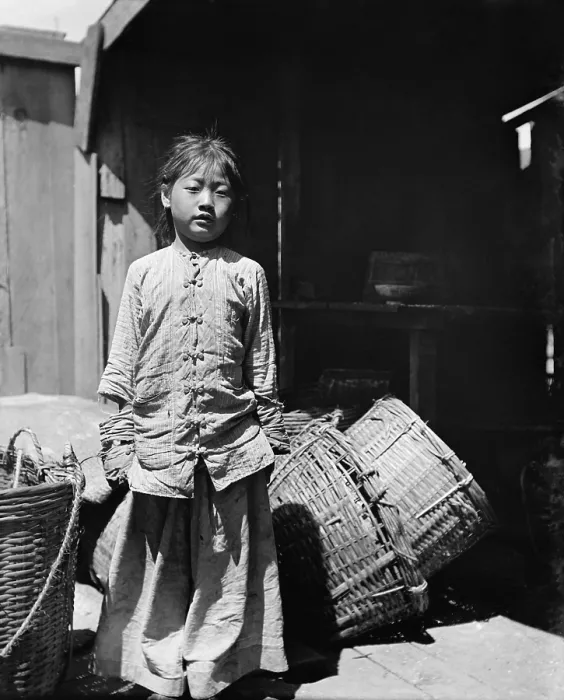Framed Print : The fish dealers daughter in Chinatown, San Francisco, wears Chinese clothing. Photo by Arnold Genthe, c. 1896-1906 (BSLOC_2018_1_49)