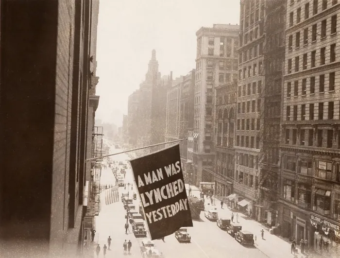 Framed Print : Flag announcing another lynching. A MAN WAS LYNCHED YESTERDAY, is flown from the window of the NAACP headquarters on 69 Fifth Ave. New York City in 1936 Framed Print : Flag announcing another lynching. A MAN WAS LYNCHED YESTERDAY, is flown from the window of the NAACP headquarters on 69 Fifth Ave. New York City in 1936
